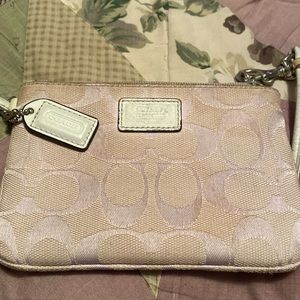 Purple Coach wristlet old and used